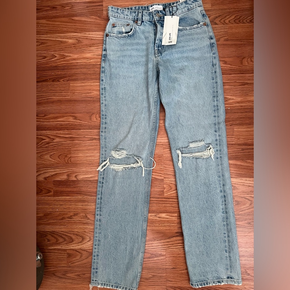 New Zara ripped knees straight leg light blue jeans in size 4